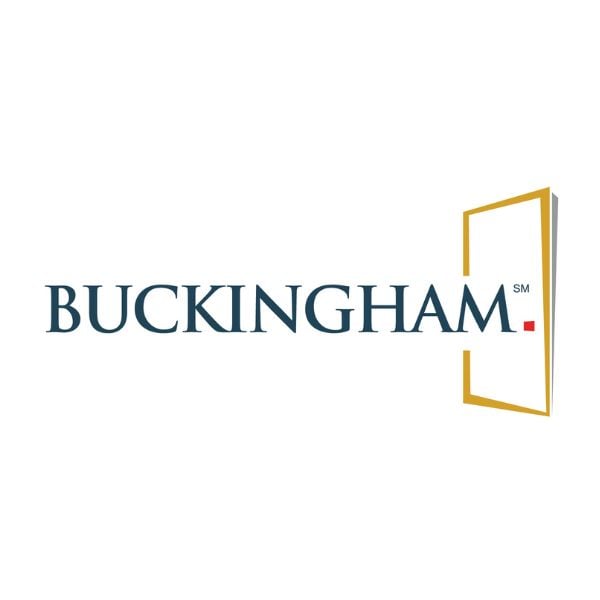 The image features the name "BUCKINGHAM" in dark blue letters, with a small red dot below the letter